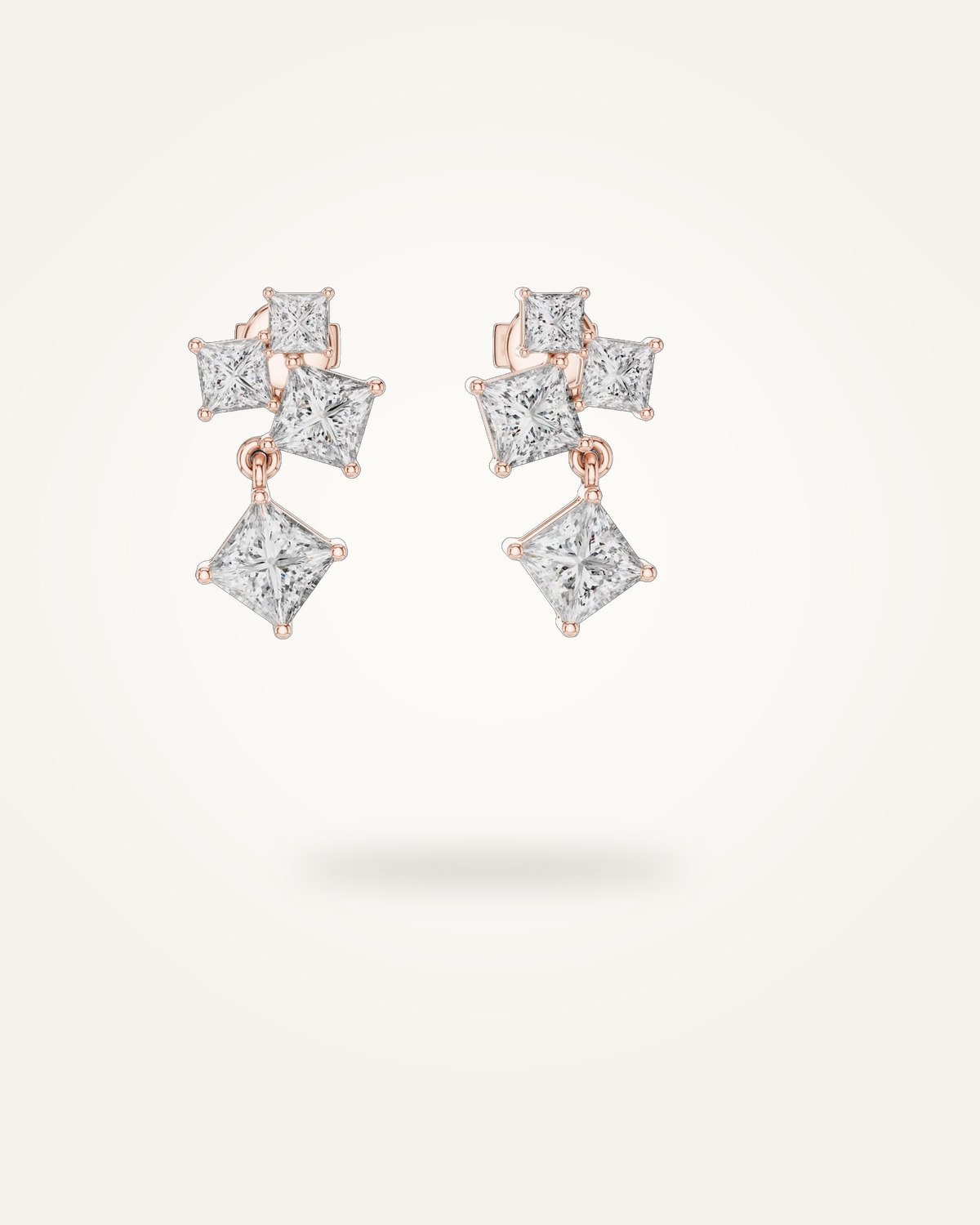 Asymmetrical princess-cut diamond cluster drop earrings